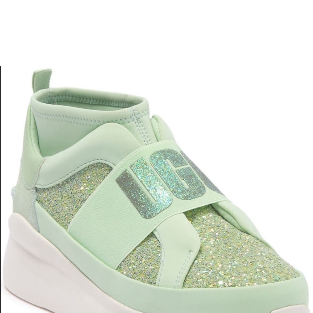 A sporty chic platform sneaker by UGG. Sizing: True to size.